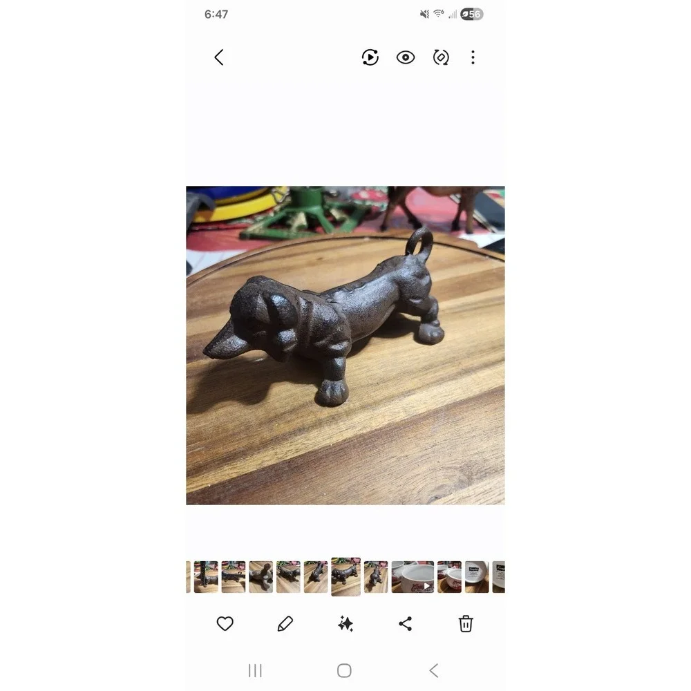 Cast Iron Black Weiner Dog Figurine.  Approx 8x6